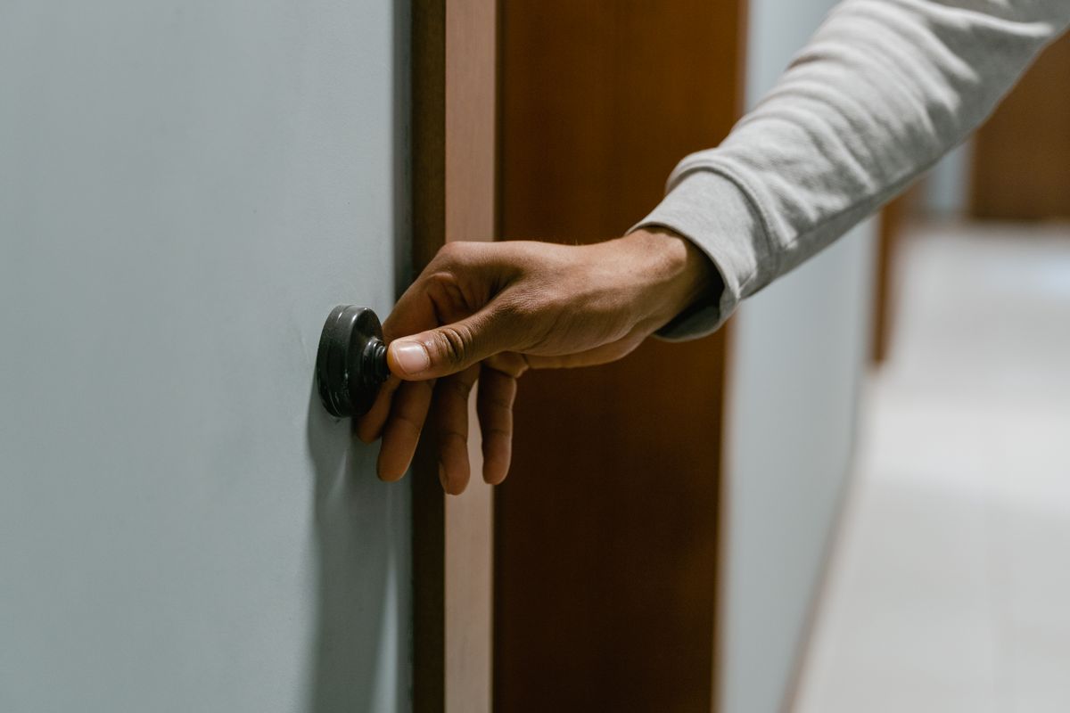 Ring Doorbell 2 mounted on building entrance, smart video doorbell security camera